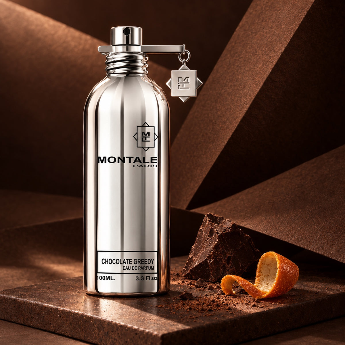 Montale Chocolate Greedy EDP 100 ml v kakaovém zátiší s čokoládou a pomerančovou kůrou – MrRizz