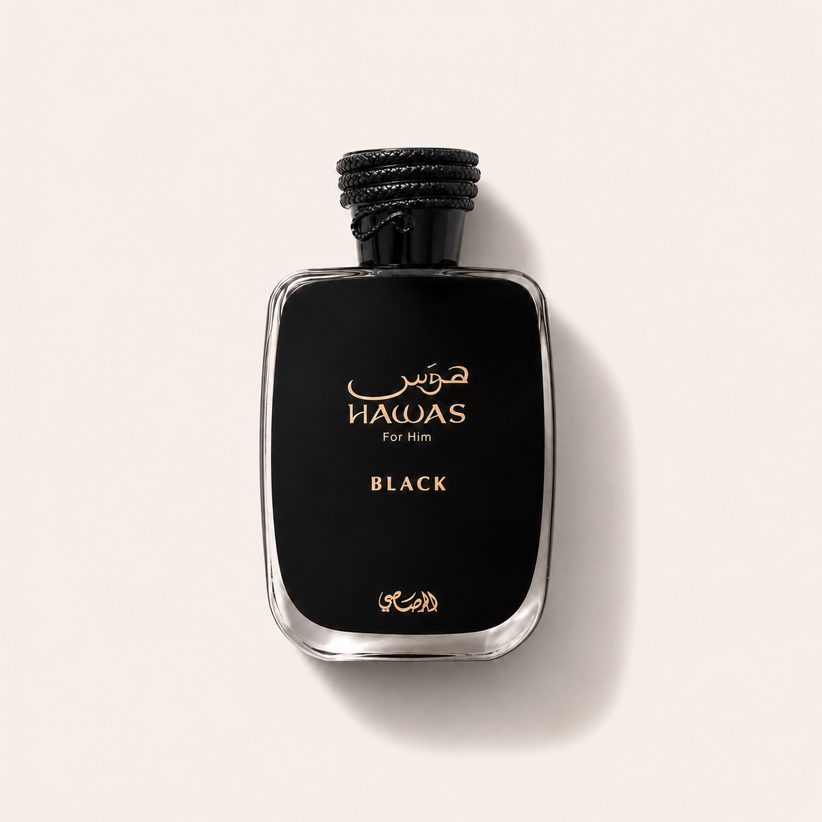 Černý flakon Rasasi Hawas Black EDP 100 ml s hadím víčkem na světlém pozadí – MrRizz